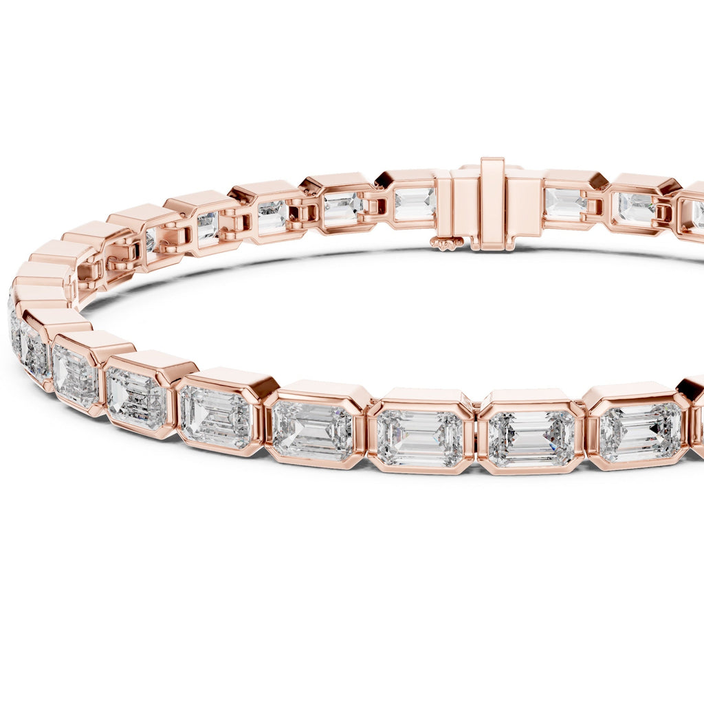 A rose gold tennis bracelet featuring emerald-cut clear diamonds, presented on a clean white background.