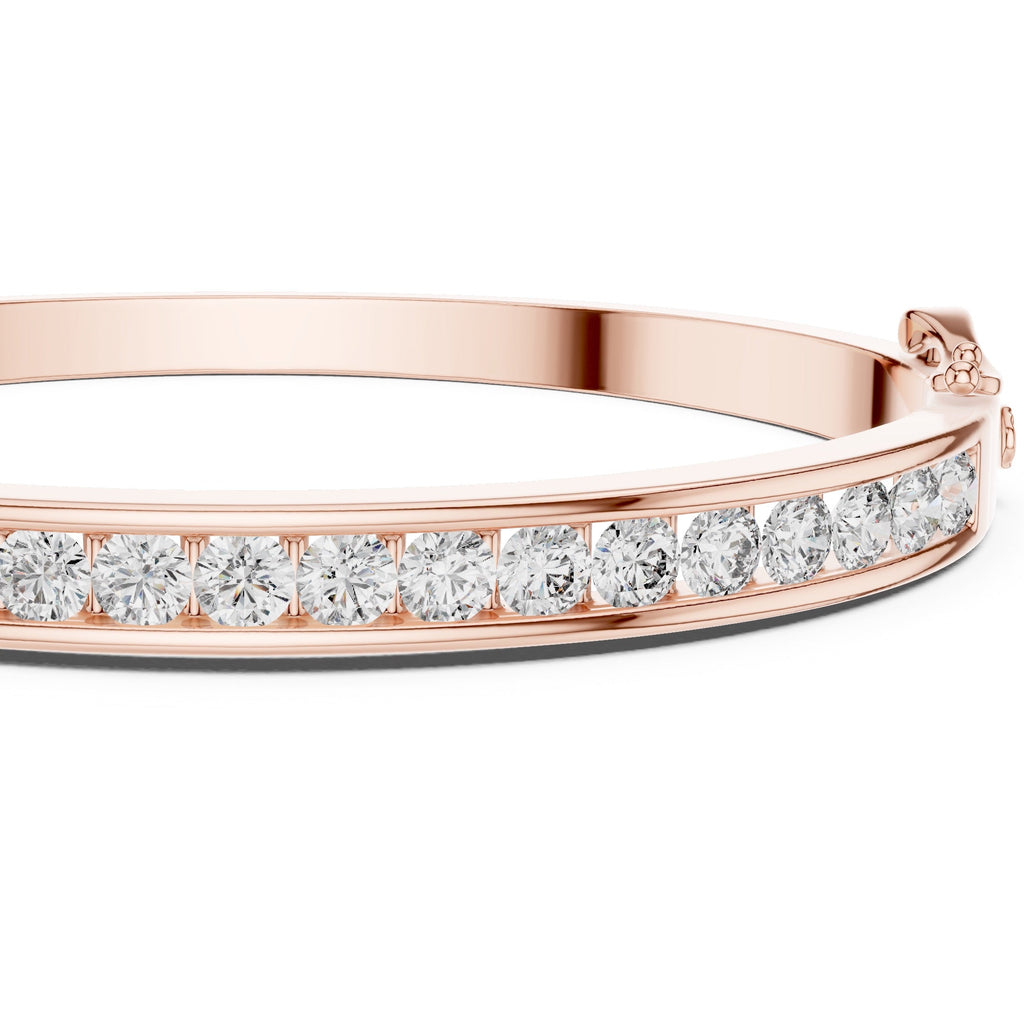 Rose gold bracelet with diamonds on a white background