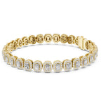 A yellow gold tennis bracelet featuring round and radiant-cut clear diamonds in a halo setting, displayed on a clean white background.