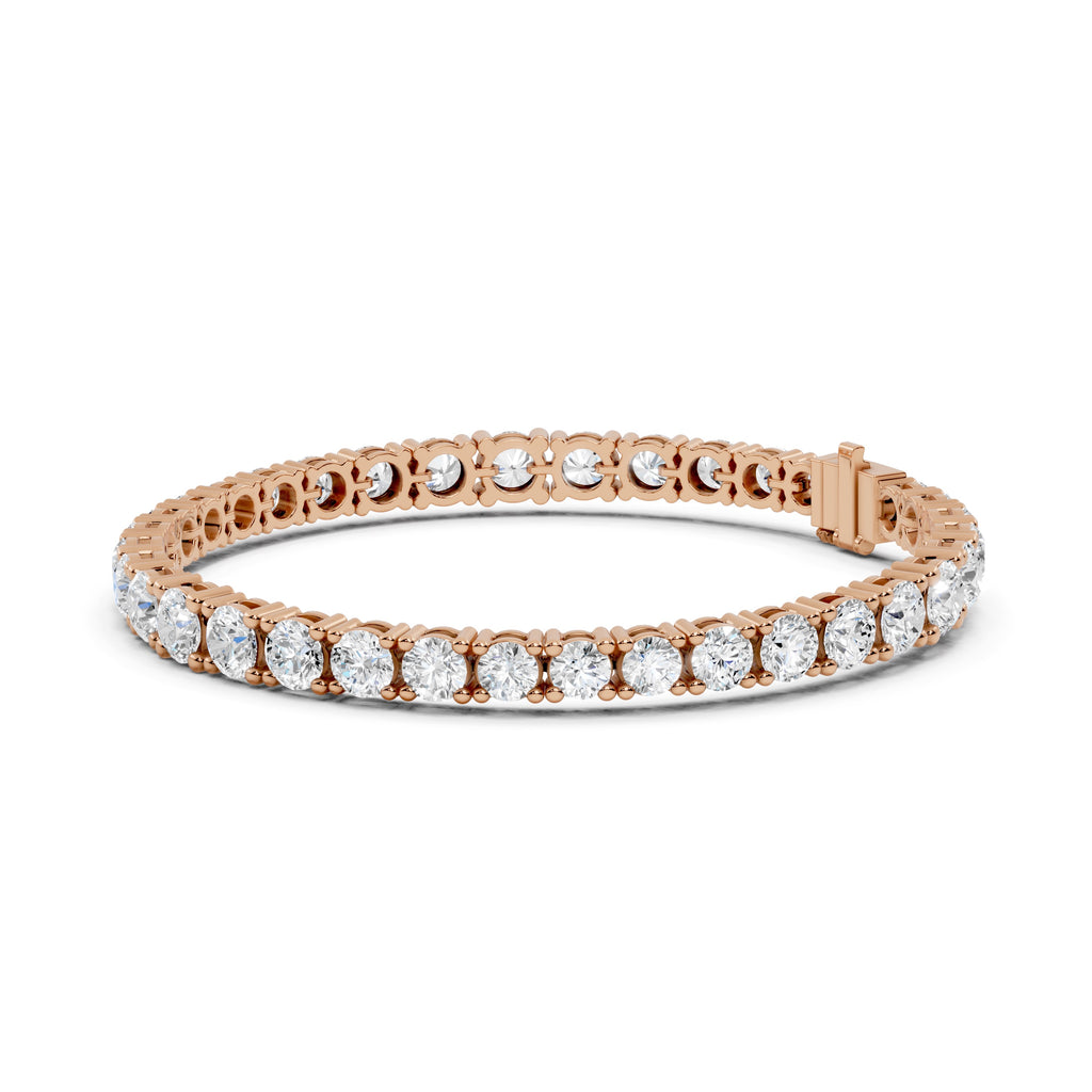 Rose gold bracelet with clear diamonds on a white background