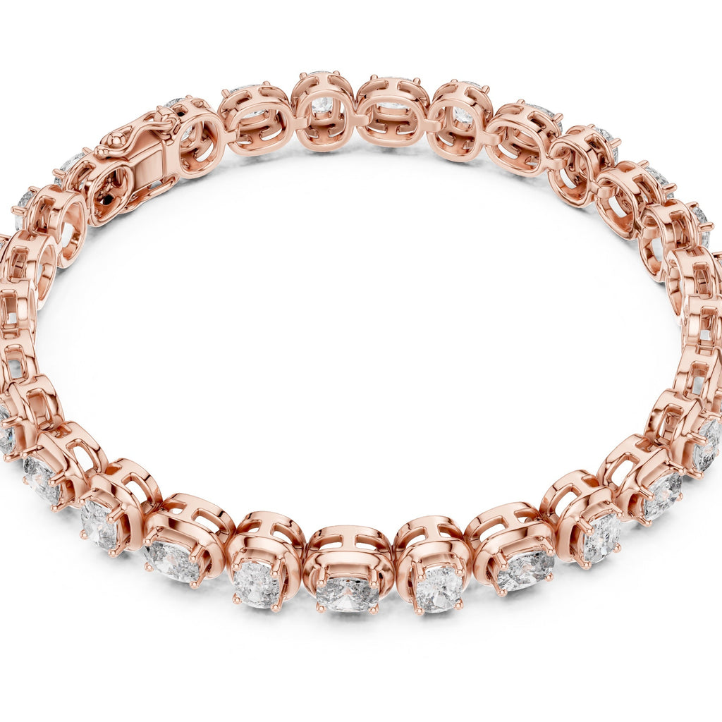 A rose gold tennis bracelet with oval-cut clear diamonds, displayed on a clean white background.