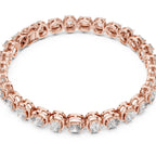 A rose gold tennis bracelet with oval-cut clear diamonds, displayed on a clean white background.