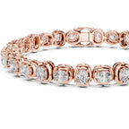 Rose gold bracelet with diamond accents on a white background