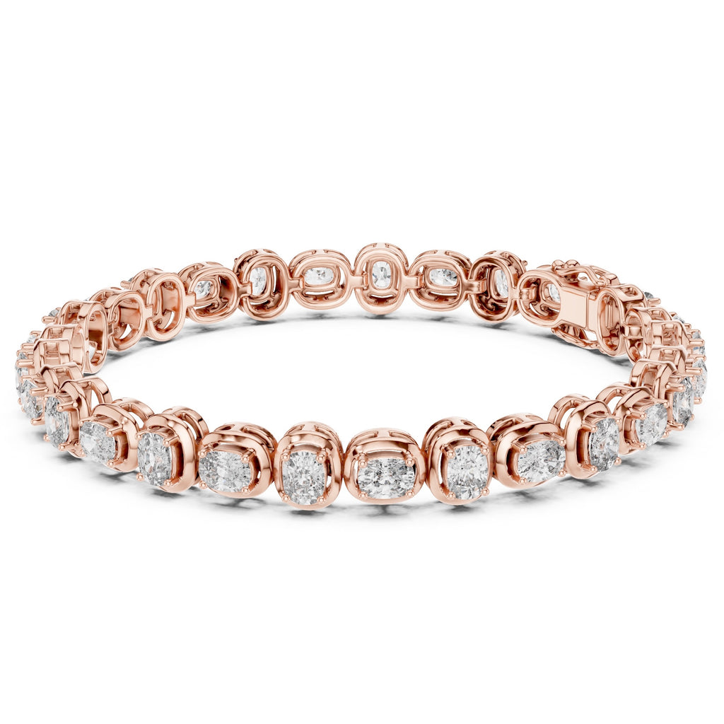 A rose gold tennis bracelet featuring oval brilliant-cut diamonds set in a continuous link design, shown against a plain white background.