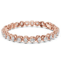 A rose gold tennis bracelet featuring oval brilliant-cut diamonds set in a continuous link design, shown against a plain white background.