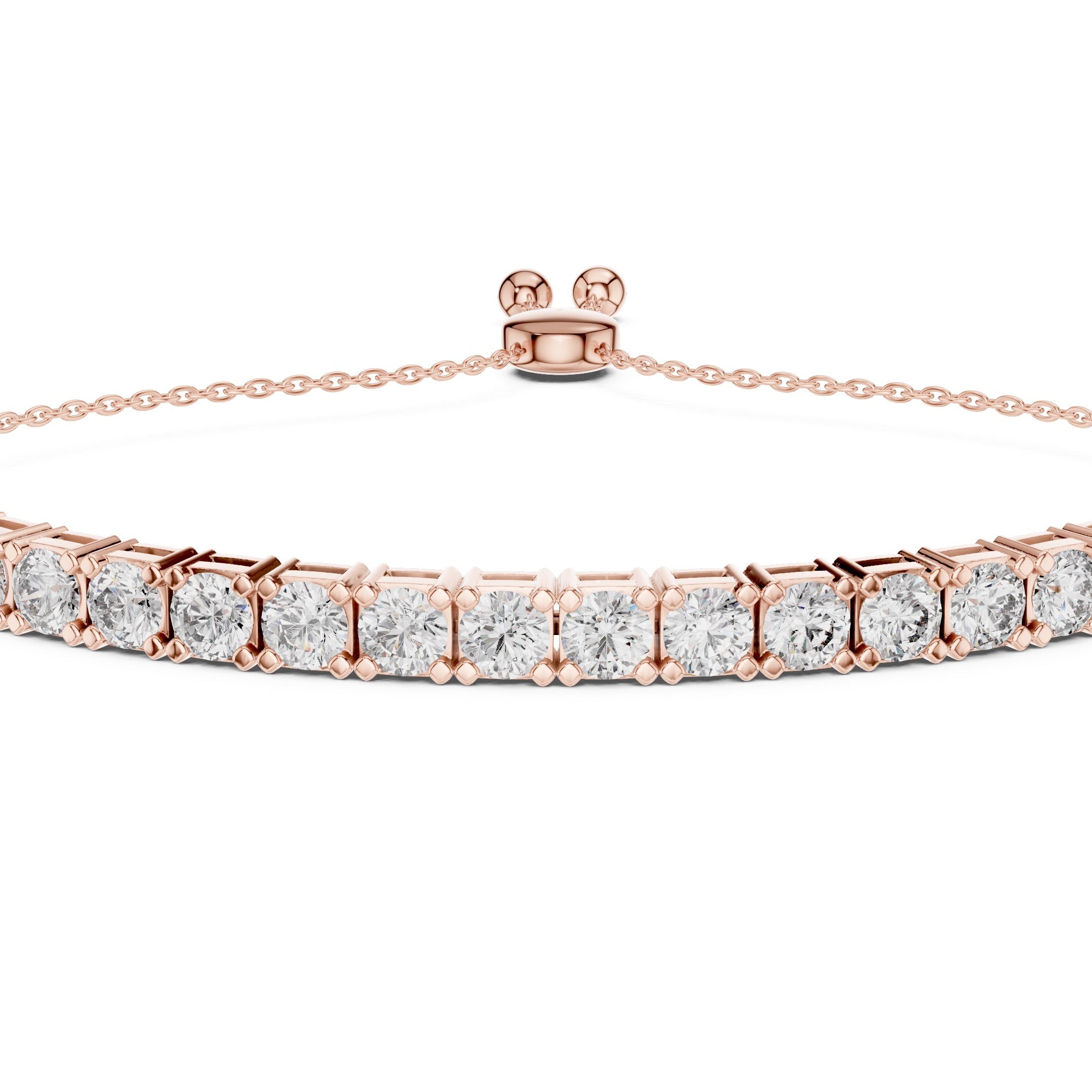 A rose gold tennis bracelet featuring a row of round-cut clear gemstones in a prong setting, displayed on a clean white background.