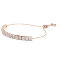 Rose gold bracelet with diamond accents on a white background