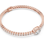 Rose gold bracelet with diamonds on a white background