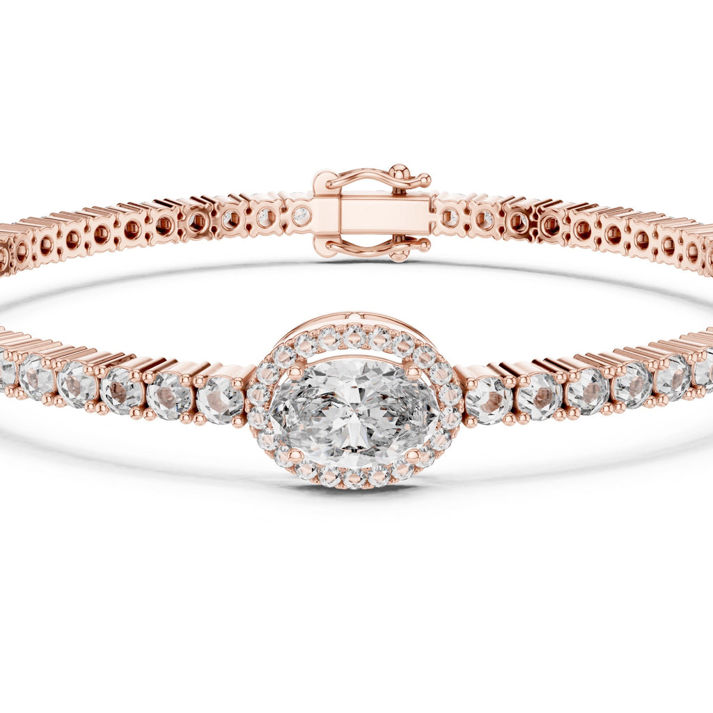 Rose gold bracelet with a central oval diamond and smaller round diamonds on a white background