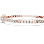 A rose gold tennis bracelet featuring a continuous line of round-cut clear diamonds in a prong setting, displayed on a clean white background.