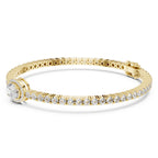 Gold bracelet with diamonds on a white background