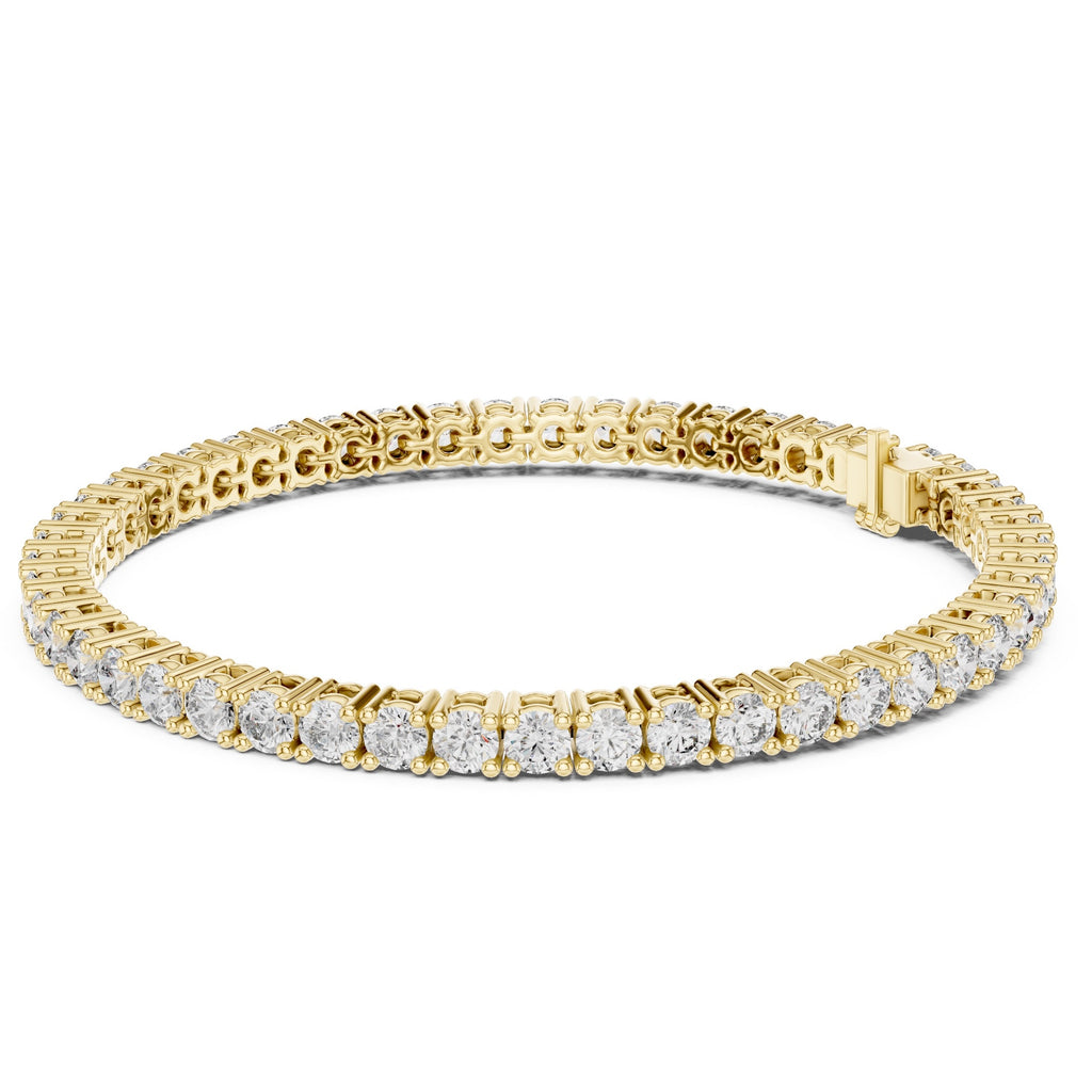 Gold bracelet with diamond accents on a white background