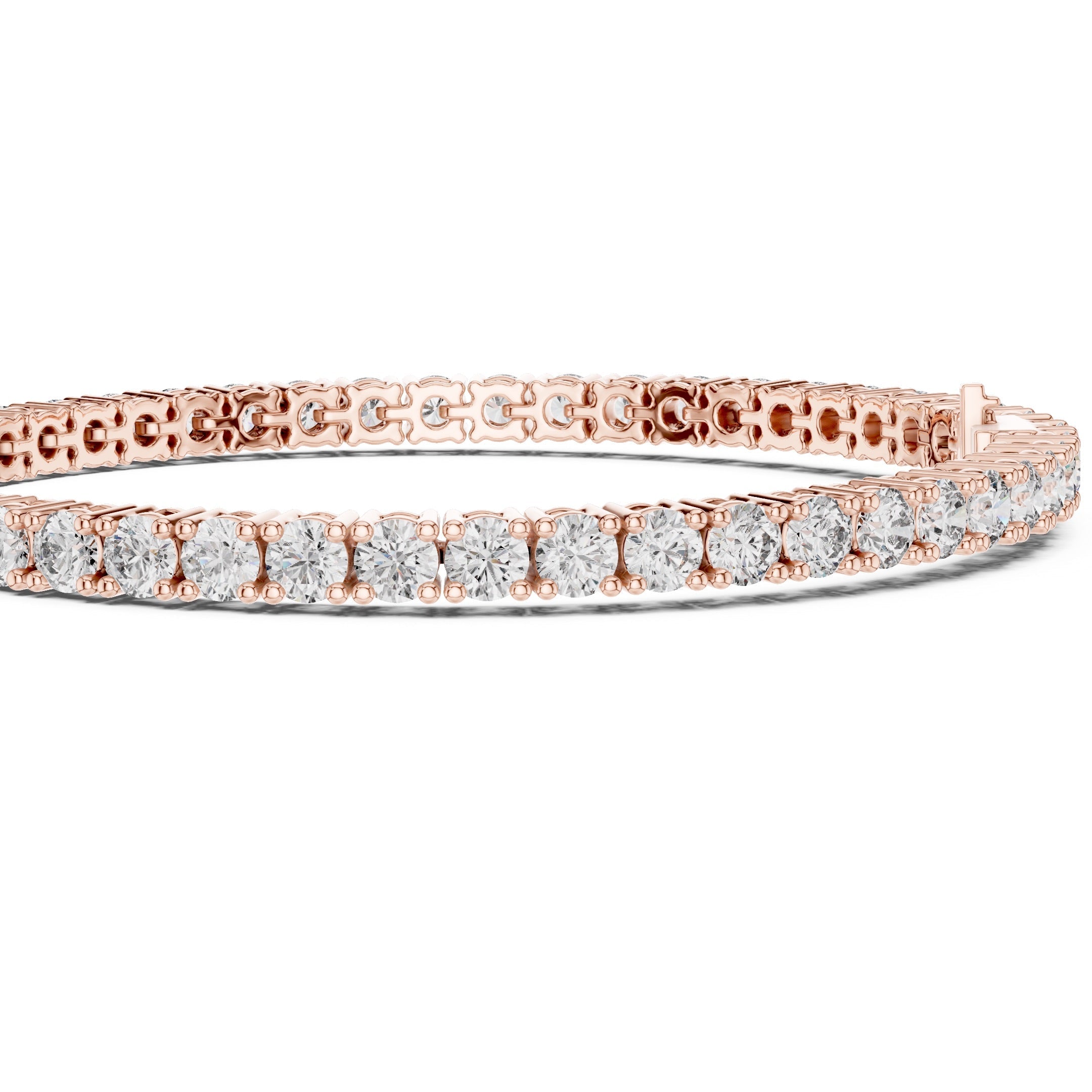 A rose gold tennis bracelet featuring a continuous row of round-cut clear gemstones, displayed on a clean white background.
