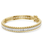 Gold bracelet with clear gemstones on a white background