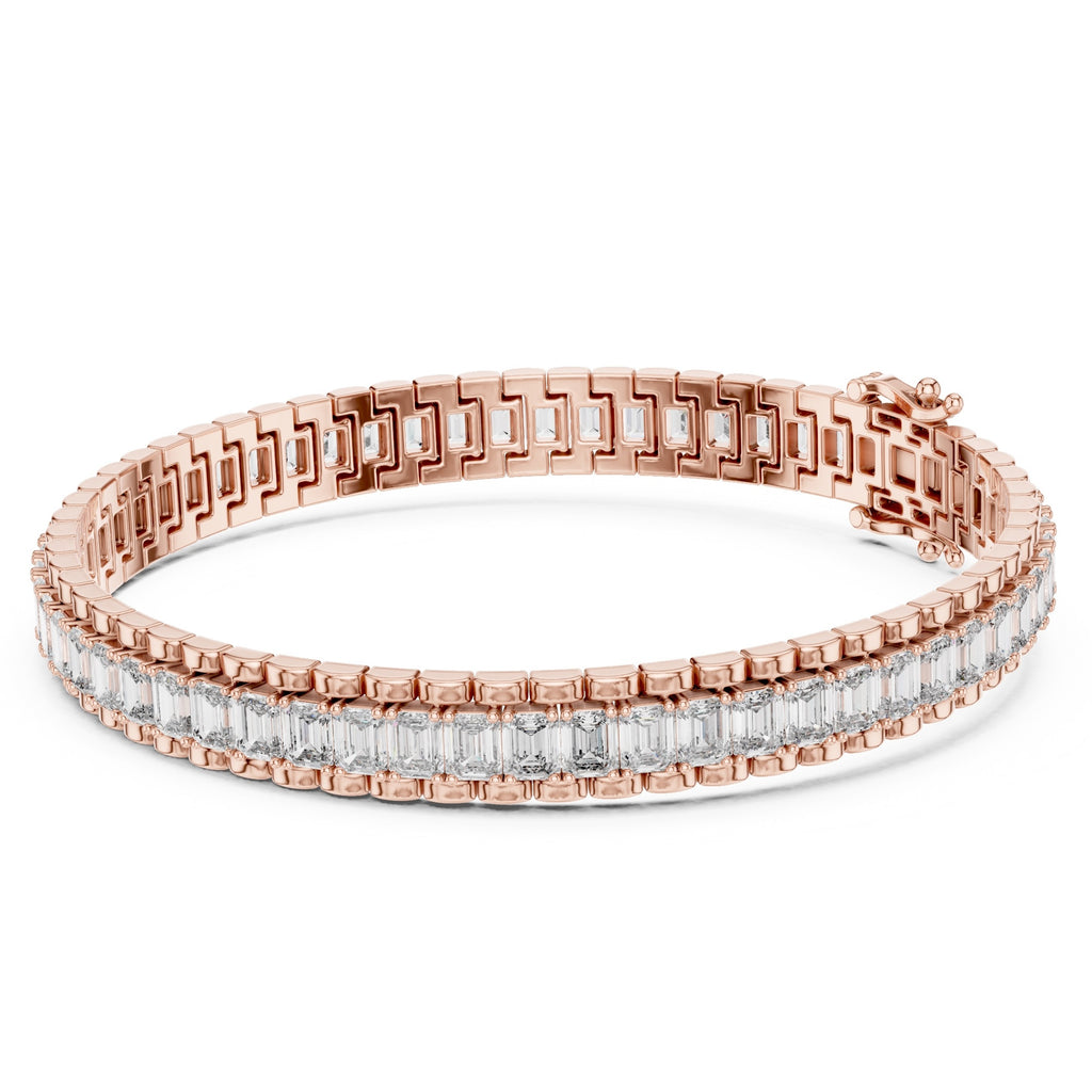 Rose gold bracelet with diamond accents on a white background