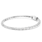 White gold bracelet with baguette diamonds on a white background