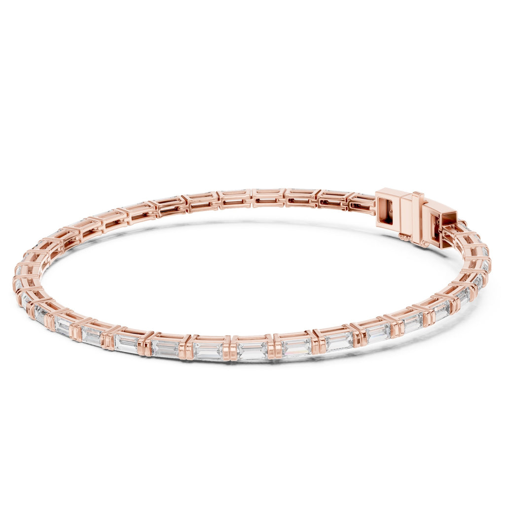 Rose gold and diamond bracelet on a white background