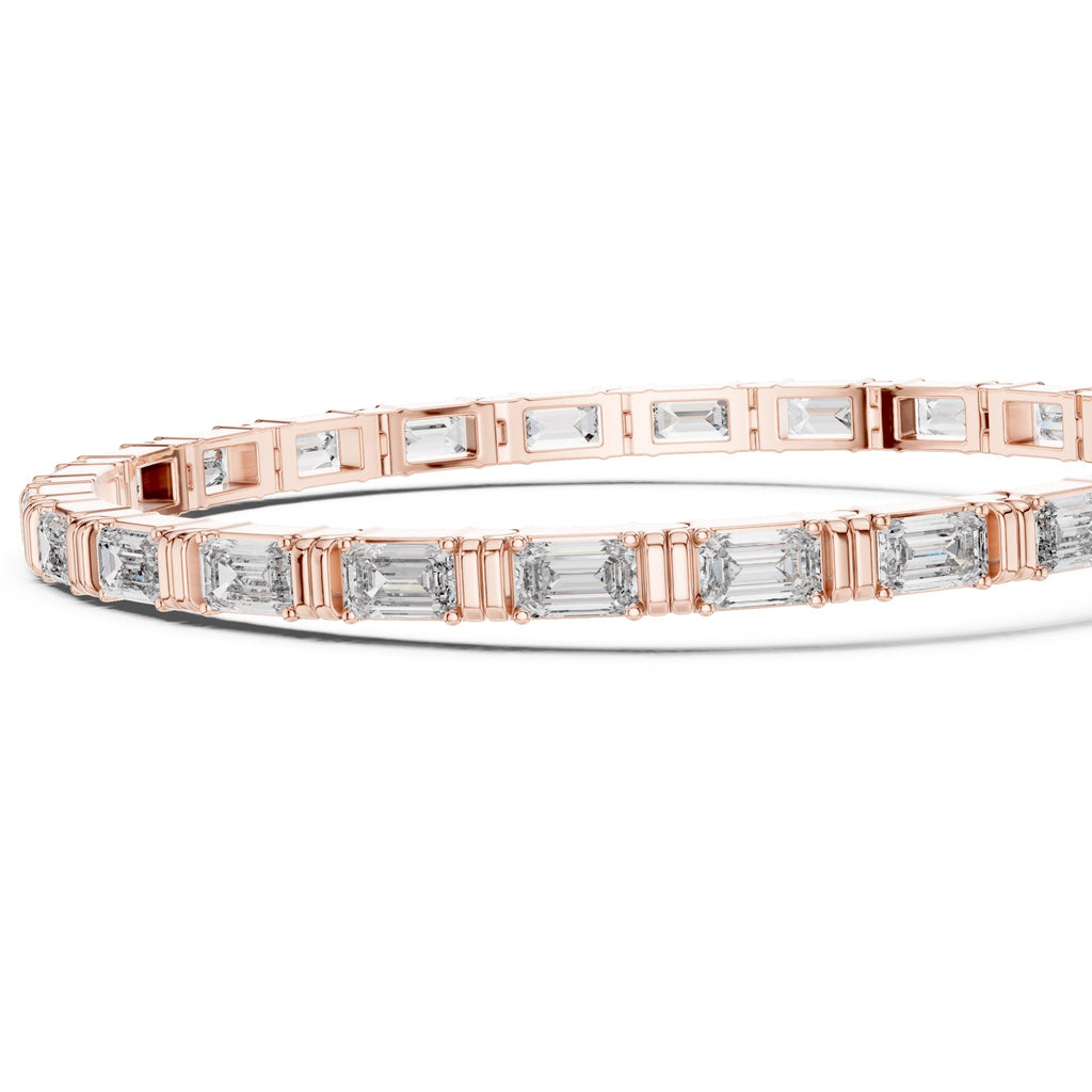 Rose gold bracelet with diamond accents on a white background