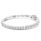 Diamond bracelet with emerald cut stones on a white background