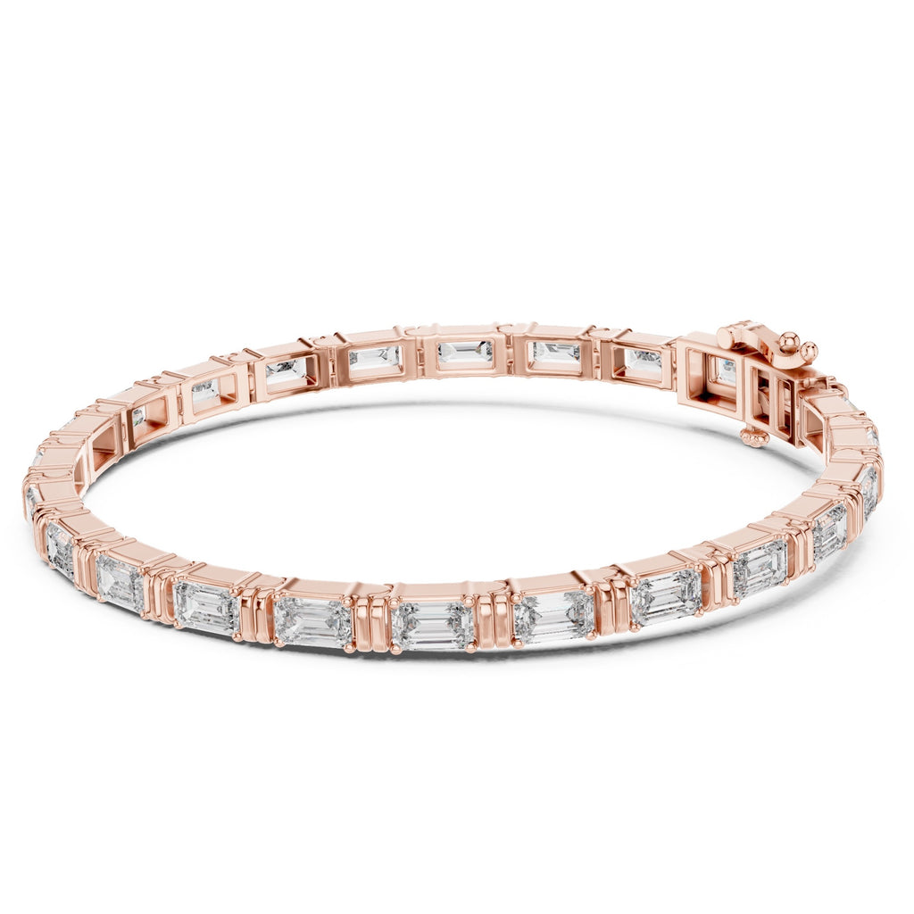 A rose gold tennis bracelet featuring emerald-cut clear diamonds, presented on a clean white background.
