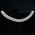 Gold chain bracelet on a black background