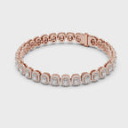 Rose gold bracelet with diamonds on a white background, rotating parallel to the surface to show the its all view from every side.