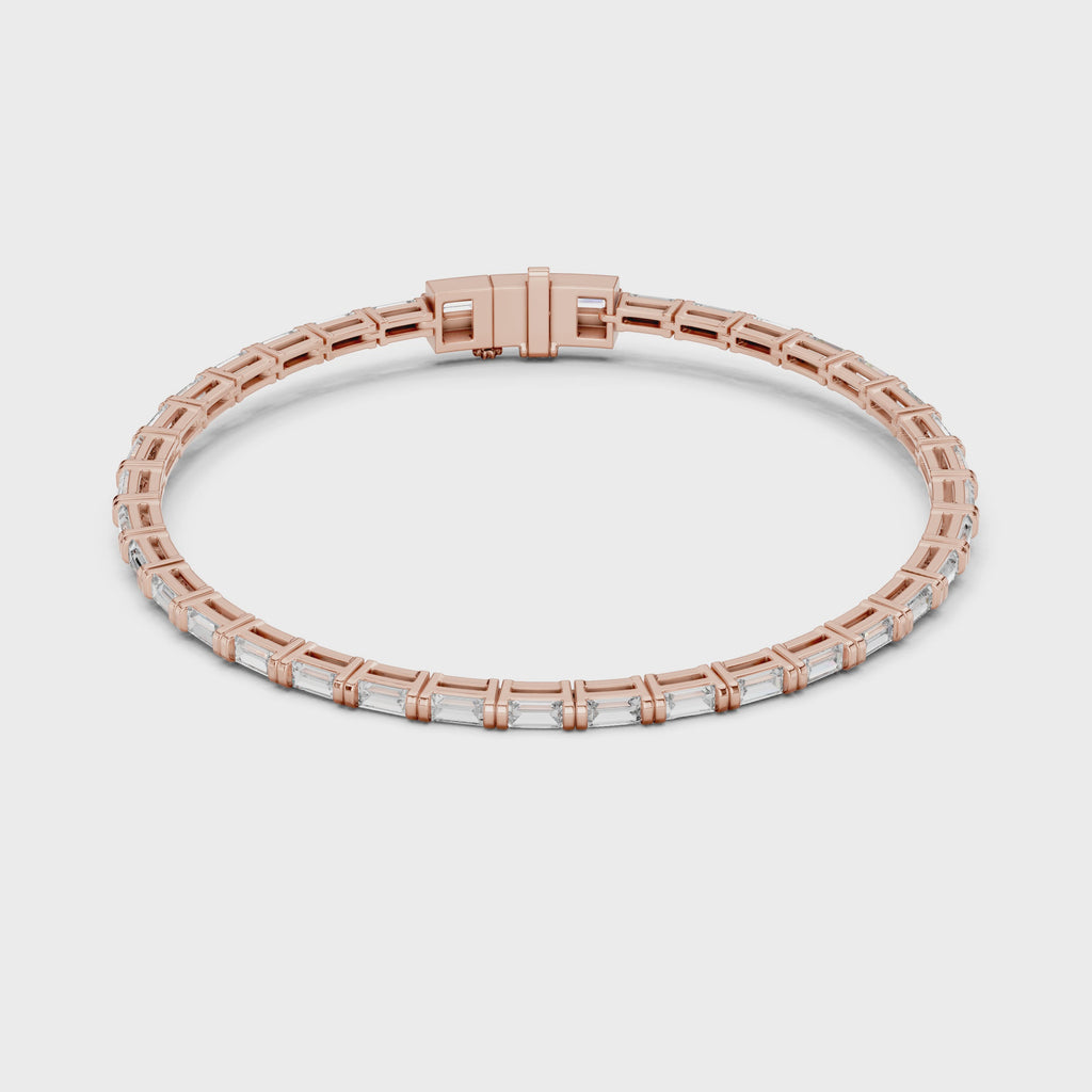 Rose gold and diamond tennis bracelet rotating parallel to the white surface to show its full view.