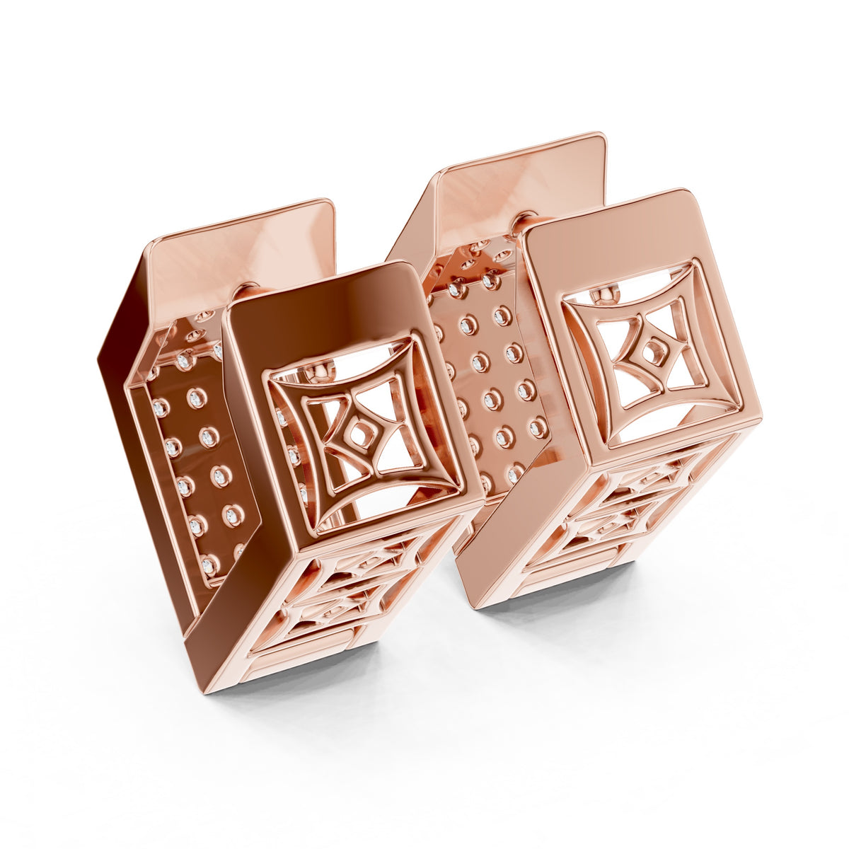Rose gold geometric earrings on a white background