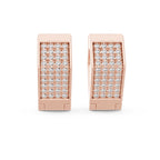Rose gold earrings with clear diamonds on a white background