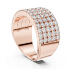 Rose gold ring with diamond accents on a white background