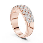 Rose gold ring with diamonds on a white background