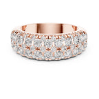 Rose gold ring with diamonds on a white background