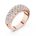 Rose gold ring with diamonds on a white background
