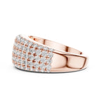 Rose gold ring with diamond accents on a white background