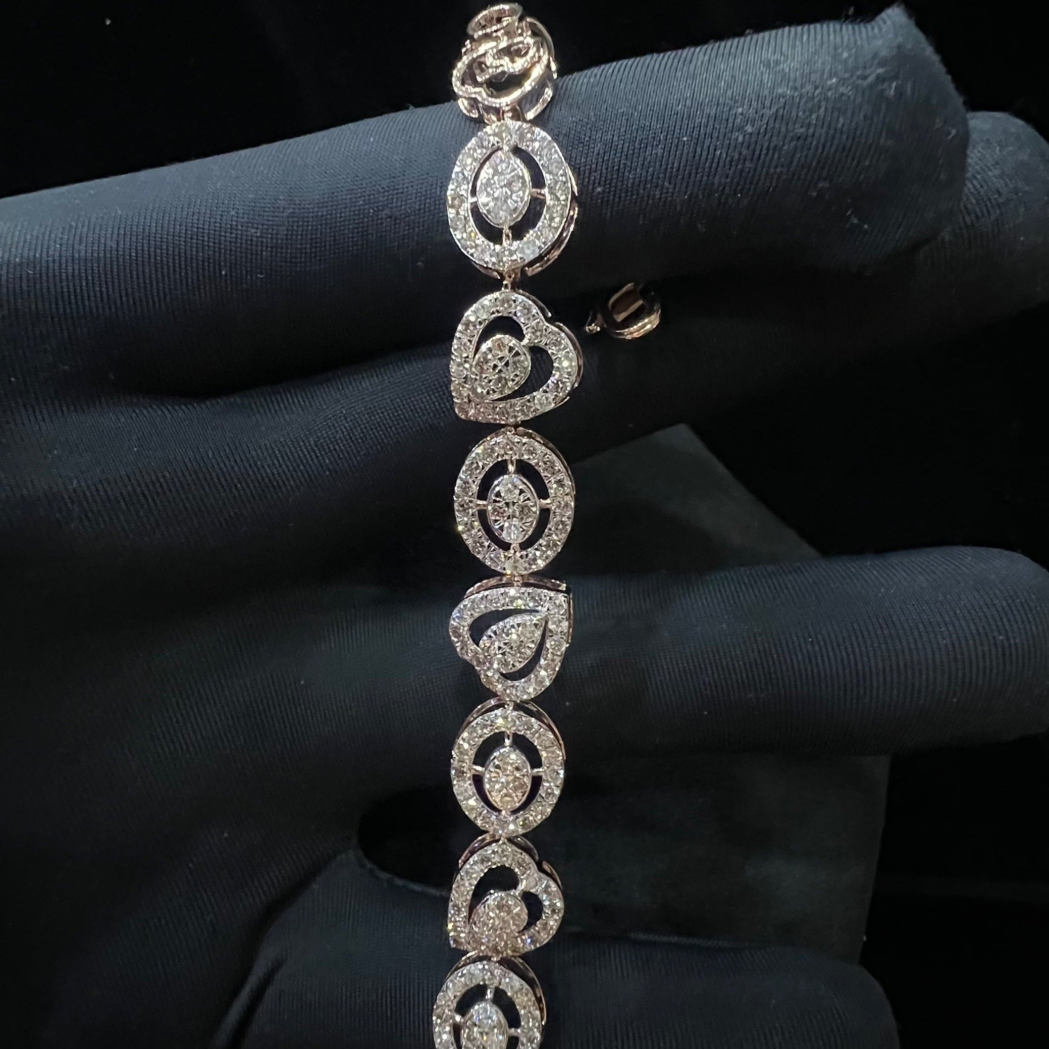 Diamond bracelet on a dark fabric background