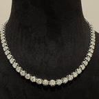 Tennis necklace with white gold and diamonds on a black bust